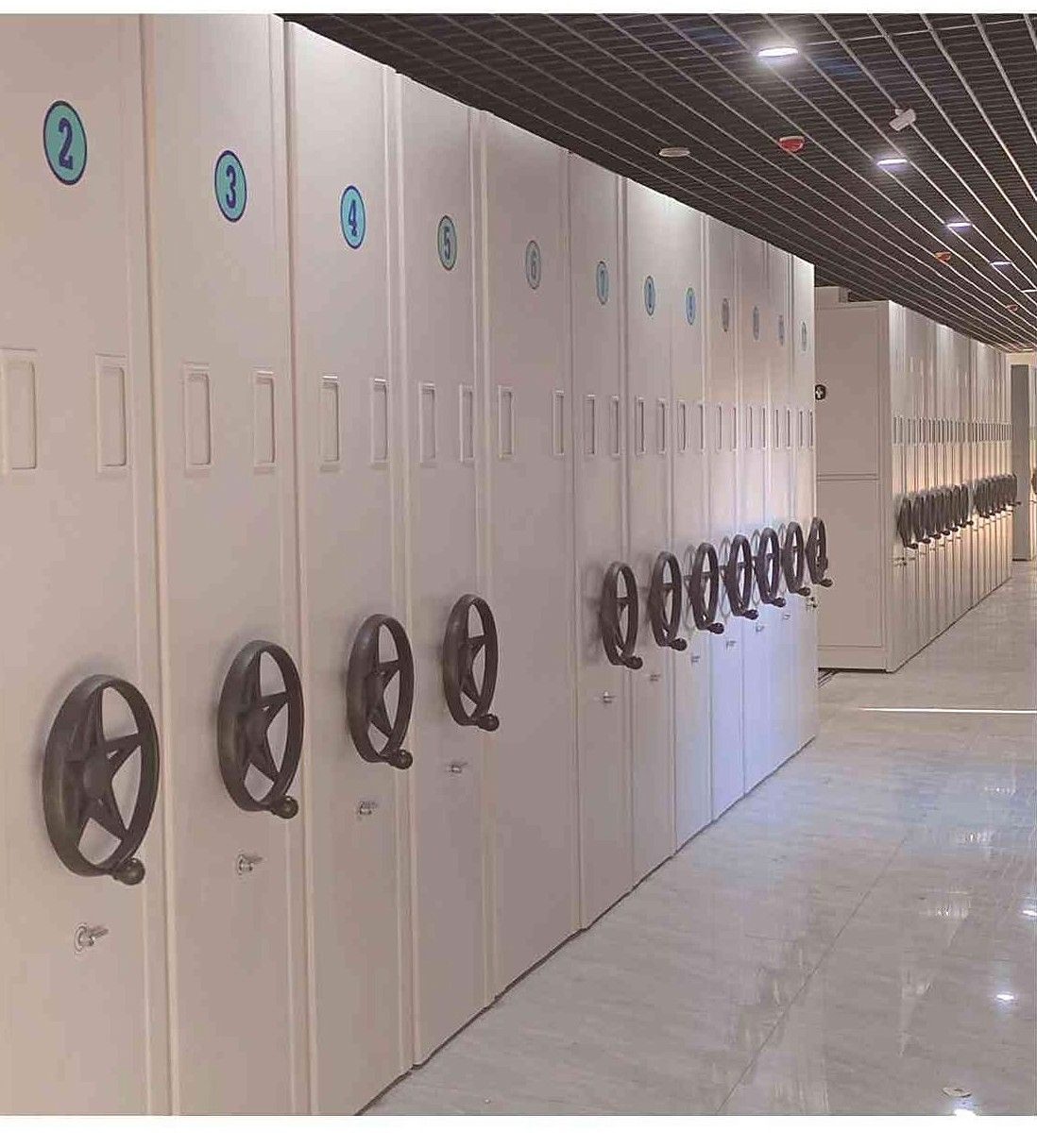 Government records archive hall with compactor shelving