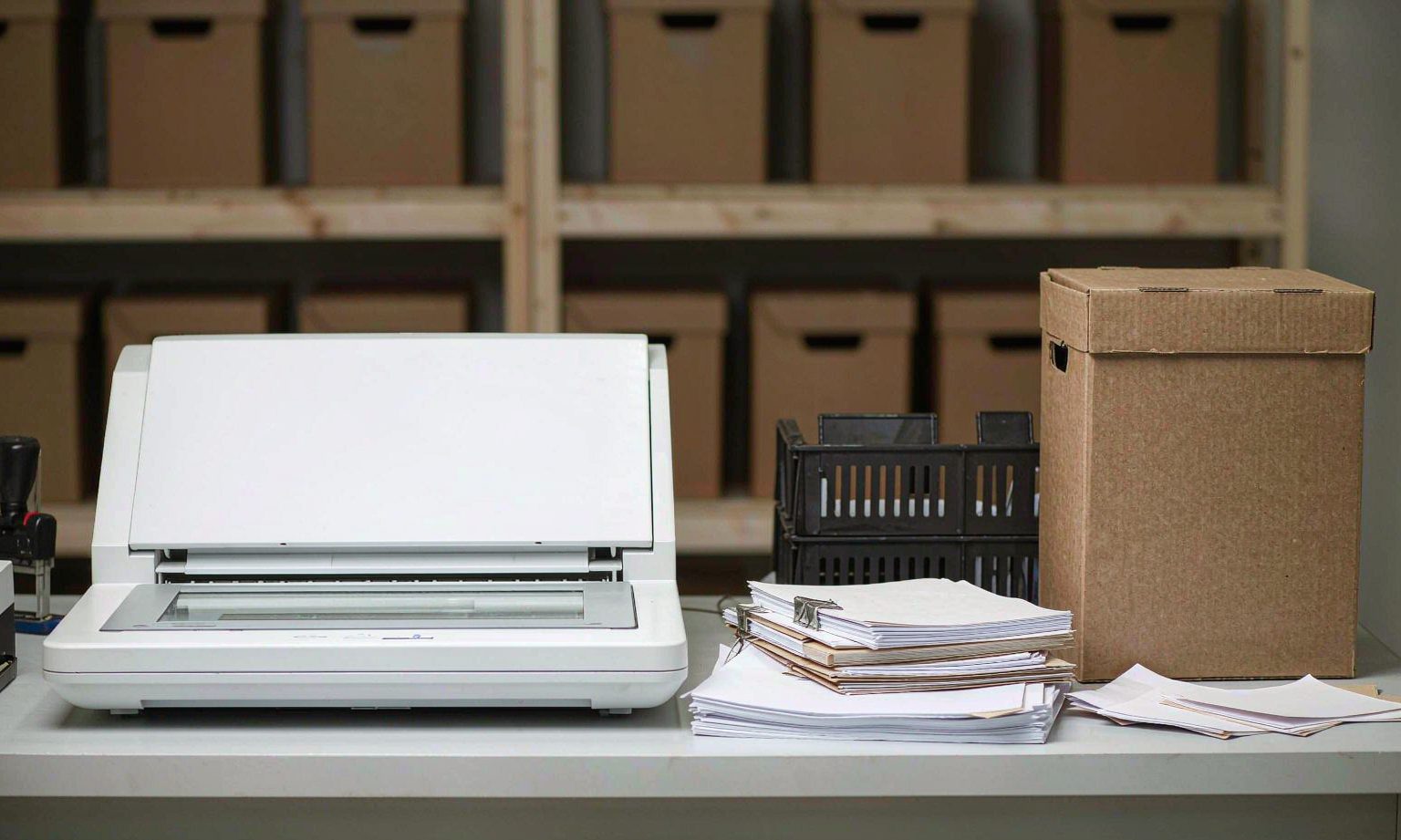 Document scanning station with an archive box in a corporate document center