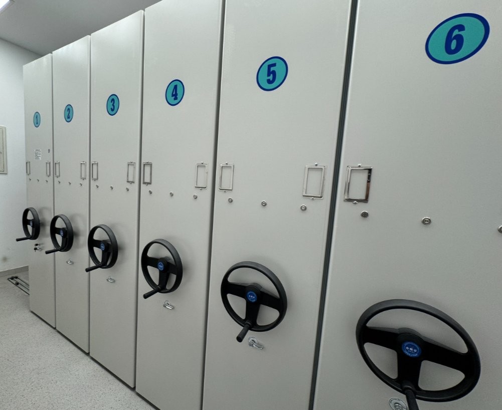 Hospital records room with electric compact shelving run