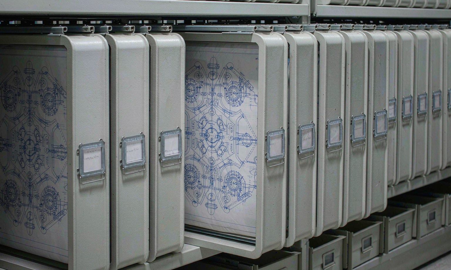 Vertical hanging drawing trays with one large sheet pulled out